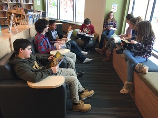 older students reading in library